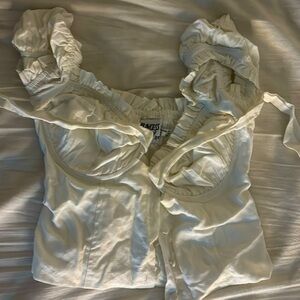 White button up crop top, tie in the front.